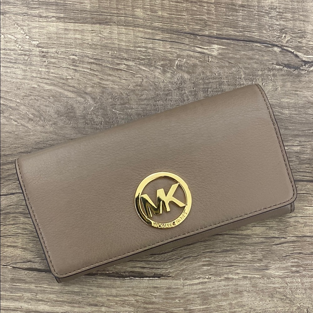 Michael Kors Brown Leather Wallet with Gold Emblem and Sleek Design